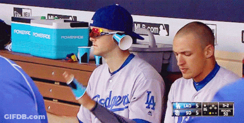 Dodgers Baseball Player In Dugout With Powerade Cooler GIF