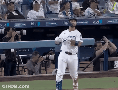 Dodgers Baseball Player In Front Of Blue Dugout GIF