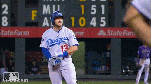 Dodgers Baseball Player In Front Of Scoreboard GIF