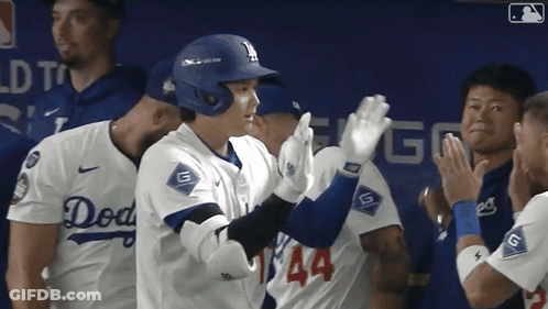Dodgers Player High Fives Another Player GIF