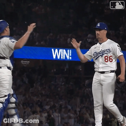 Dodgers Player High Fives Teammate In Front Of Win Sign GIF