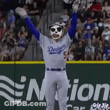 Dodgers Player In Panda Mask Raising Arms GIF