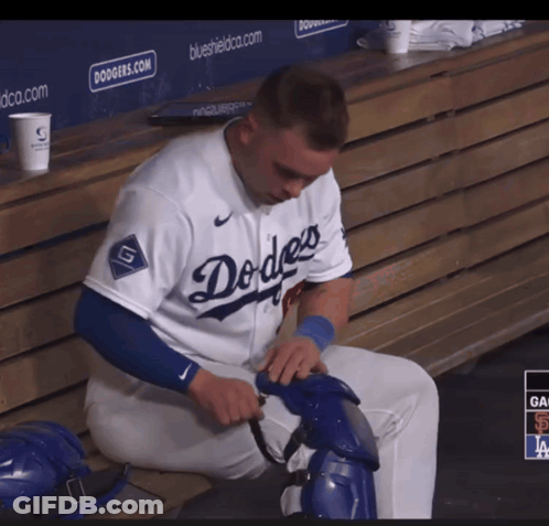 Dodgers Player Sitting On Dugout Bench GIF