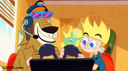 Dog And Boy Playing Video Game On Laptop GIF