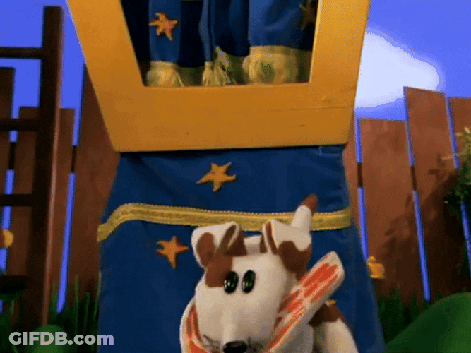 Dog Puppet Tossing Steak GIF