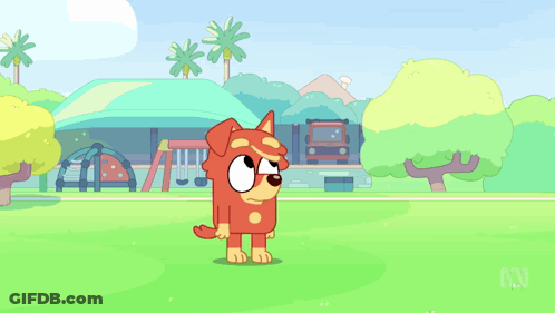 Dog Standing In Front Of Playground GIF