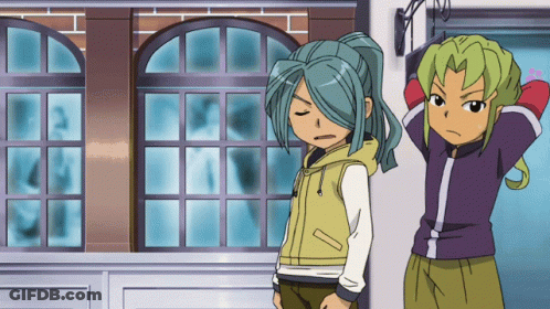Dog Walking Down Snowy Street GIF
