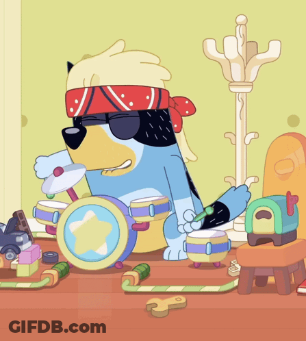Dog Wearing Sunglasses And Bandana Playing Drums GIF