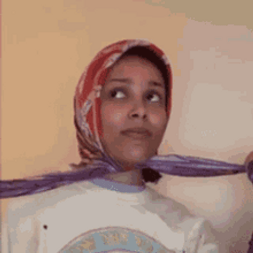 Doja Cat Tied Towel Head Looking Up GIF