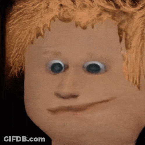 Doll Face Close Up With Big Eyes And Smile GIF