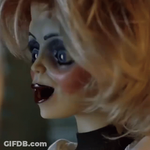 Doll Face With Big Blue Eyes GIF