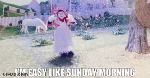 Doll In Garden Saying I'm Easy Like Sunday Morning GIF