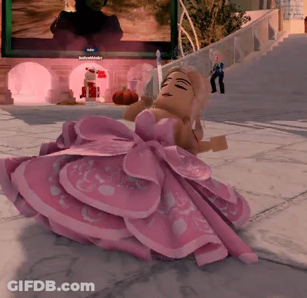 Doll In Pink Dress Sitting GIF