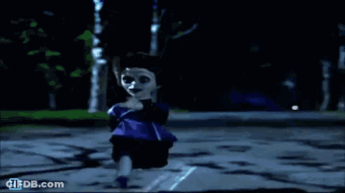 Doll In Purple Dress Running Down Street At Night GIF