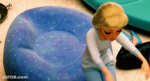 Doll On Blue Bean Bag Chair With Stars GIF
