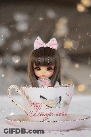 Doll Sitting In Teacup Saying Dobry Mers GIF