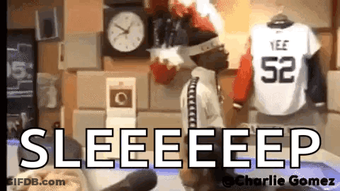 Doll Standing In Front Of Clock And Jersey Saying Seeeeep GIF