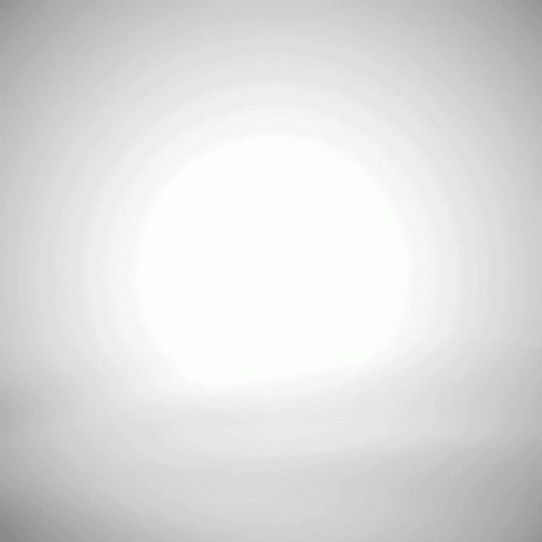 Doll Waving While Riding Wrecking Ball GIF