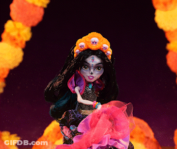 Doll With Skulls On Head And Cross On Face GIF