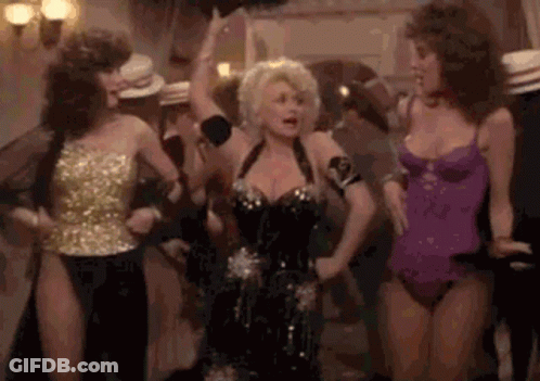 Dolly Parton Dancing With Women In Swimsuits GIF