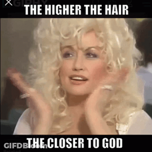 Dolly Parton In Blonde Wig Making Funny Face GIF