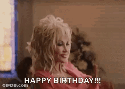 Dolly Parton In Pink Dress Saying Happy Birthday GIF