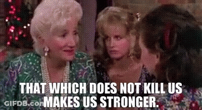 Dolly Parton Smiling In Gold Dress And Earrings GIF