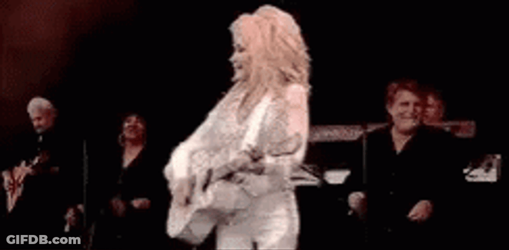 Dolly Parton With Suit And Guitar GIF