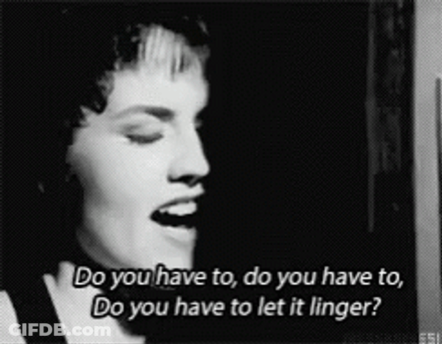 Dolores Oriordan Half Face Showing GIF