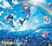 Dolphins Are Swimming In The Ocean With A Rainbow GIF