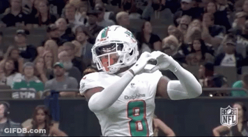 Dolphins Player Making Heart With Hands In Front Of Crowd GIF