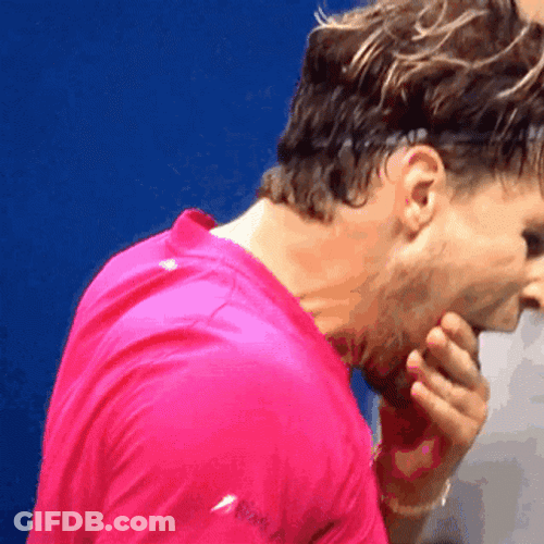 Dominic Thiem Biting His Hands GIF