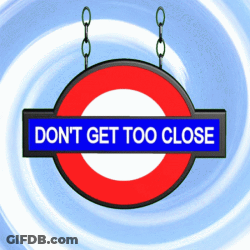Don't Get Too Close Sign Hanging From Chains GIF