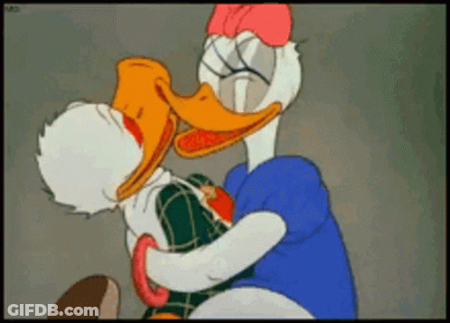 Donald Duck And Daisy Duck Are Hugging Each Other GIF