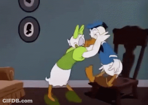 Donald Duck And Daisy Duck Are Hugging In A Cartoon . GIF