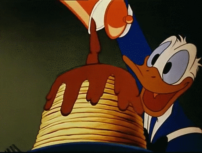 Donald Duck Happily Making Breakfast GIF