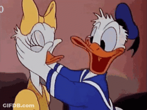 Donald Duck Is Covering Daisy Duck 'S Eyes With His Hands GIF
