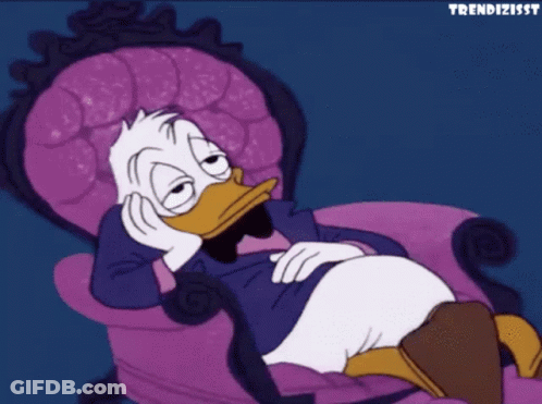 Donald Duck Laying In Chair GIF