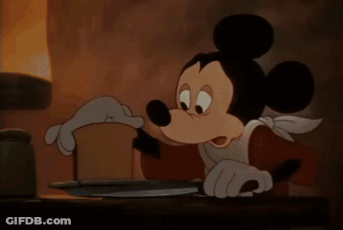 Donald Duck Sitting At Table With Food GIF