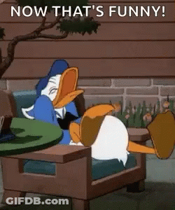 Donald Duck Sitting In Chair With Legs Crossed GIF