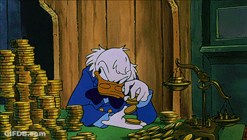 Donald Duck Sitting In Front Of Gold Coins GIF