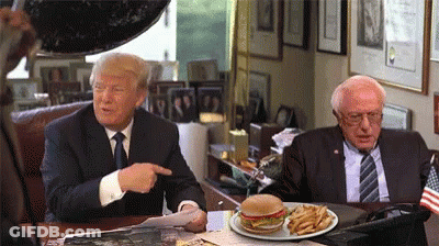 Donald Trump And Bernie Sanders Sitting At Table With Hamburger And Fries GIF
