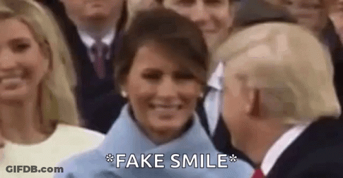 Donald Trump And Melania Trump Are Smiling At Each Other In A Crowd Of People . GIF