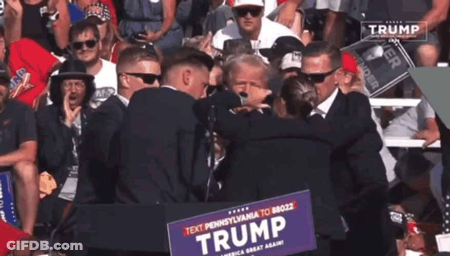Donald Trump Escorted By Many Men GIF