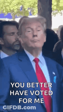Donald Trump In Blue Suit And Red Tie Making Funny Face GIF