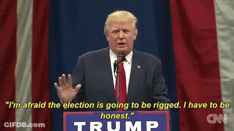 Donald Trump Is Giving A Speech At A Podium With A Sign That Says Trump On It GIF