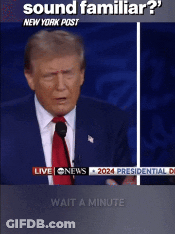 Donald Trump Is Giving A Speech In Front Of A Live Cnn News Screen GIF