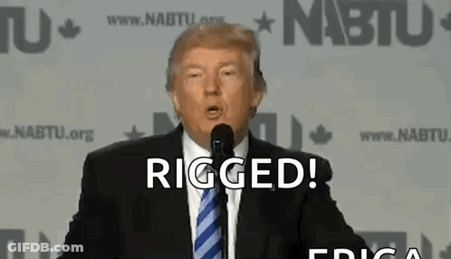 Donald Trump Is Giving A Speech In Front Of A Microphone . GIF
