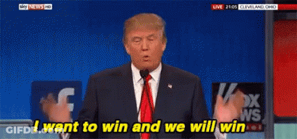 Donald Trump Is Giving A Speech In Front Of A Microphone While Saying I Want To Win And We Will Win . GIF