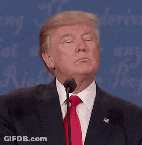 Donald Trump Is Making A Funny Face While Speaking Into A Microphone At A Debate . GIF